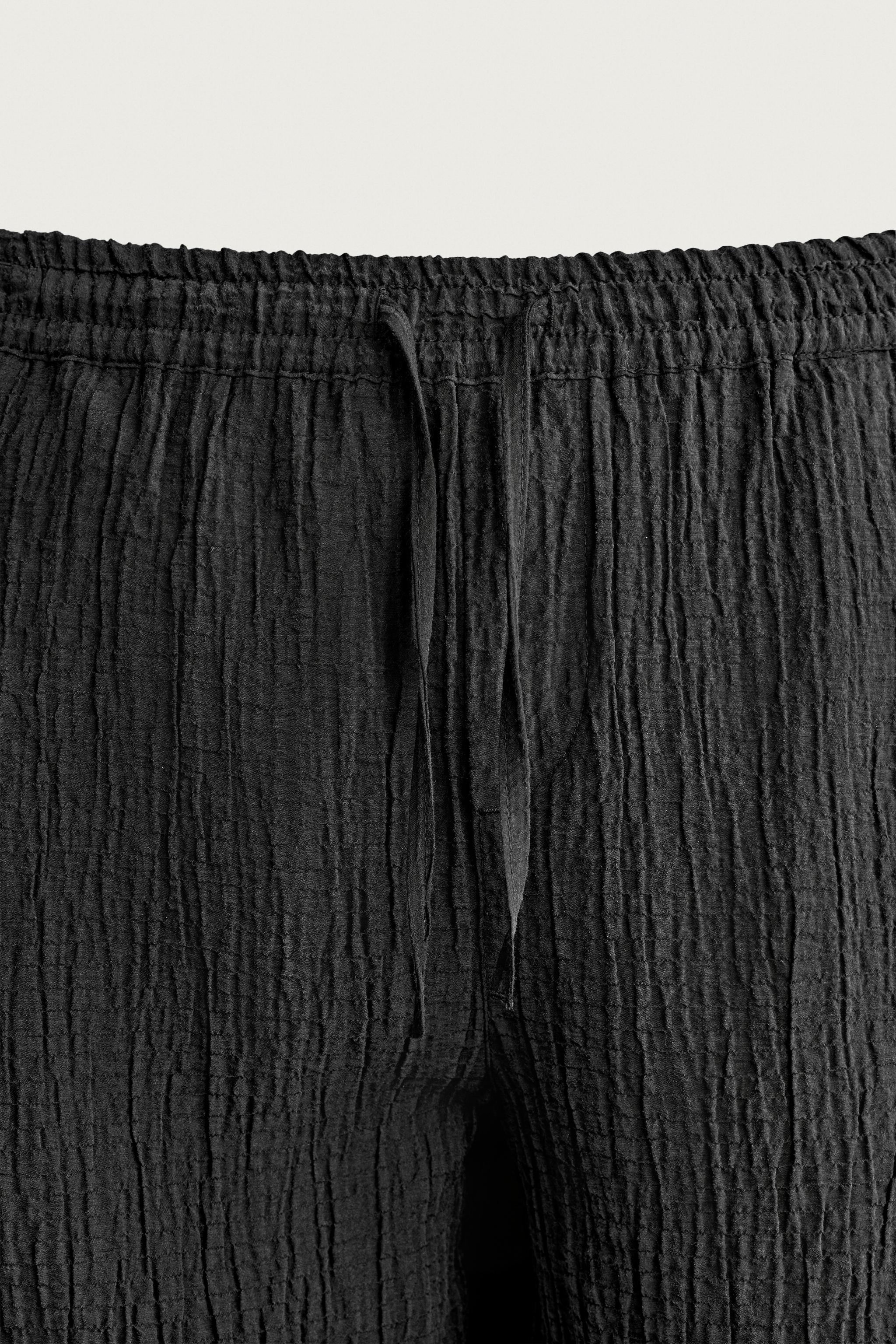 TEXTURED RELAXED FIT SHORTS